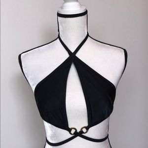 Victoria’s Secret black wrap bikini top with gold hardware. FITS LIKE A SMALL.